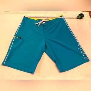 O’Neill blue used board shorts in great condition size 34